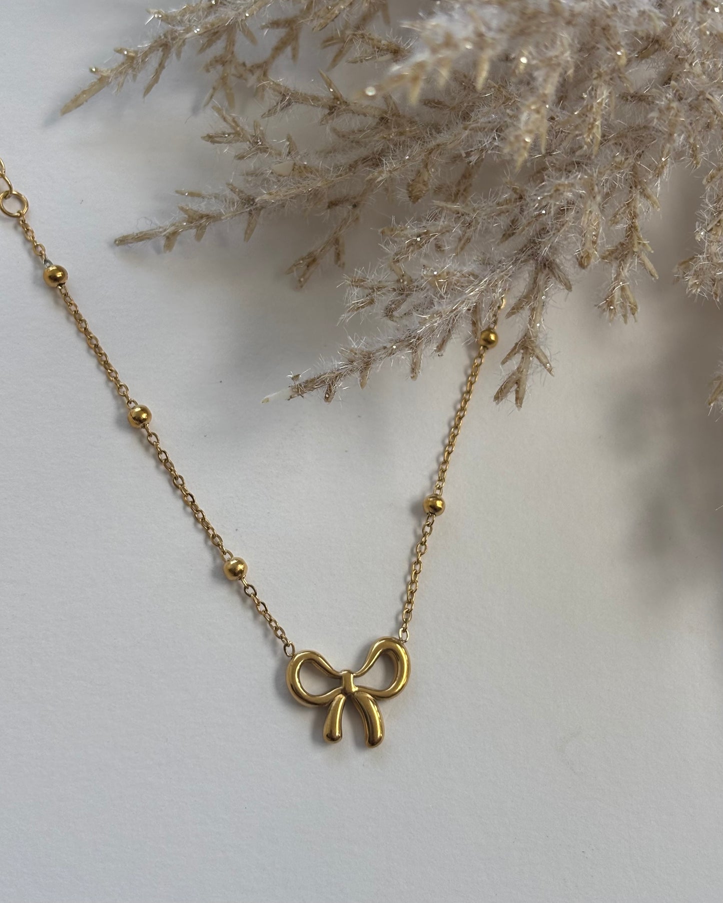 Bow Necklace.